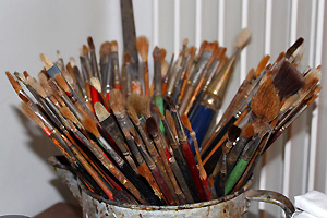 Pot with painting brushes