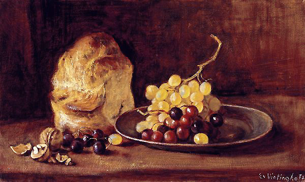 Bread and grapes on pewter plate