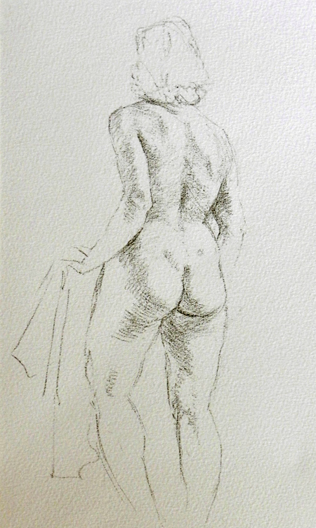 Standing female nude, back view, left hand holds towel