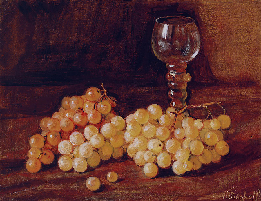 Grapes with white wine glass